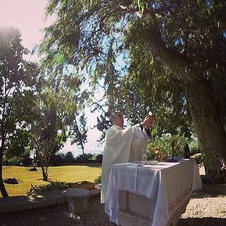 Fr Mike celebrating Mass at the Mount of Beatitudes