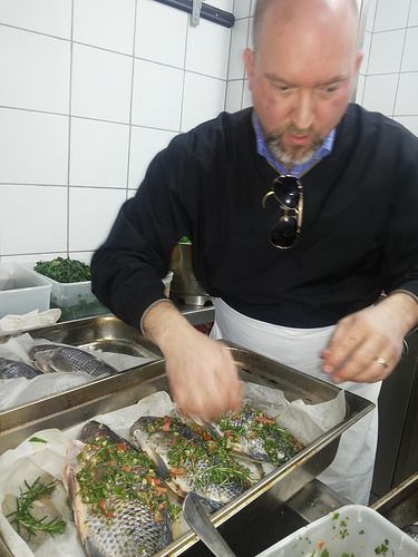 The Catholic Foodie Preparing St Peters Fish for the group.
