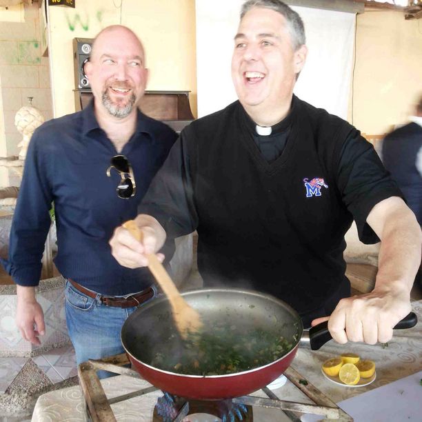 The Catholic Foodie and Fr Mike Cooking Dandelion Greens with Onions