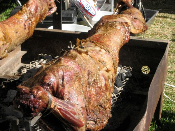 Lambs roasting on a spit